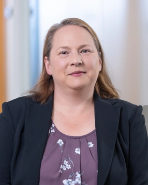 smiling person in business attire